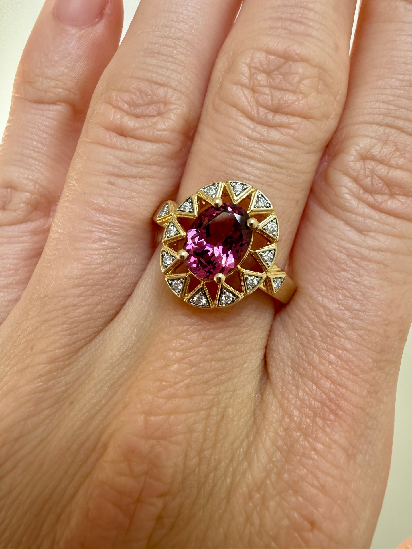 The 10k Sunburst Garnet Ring