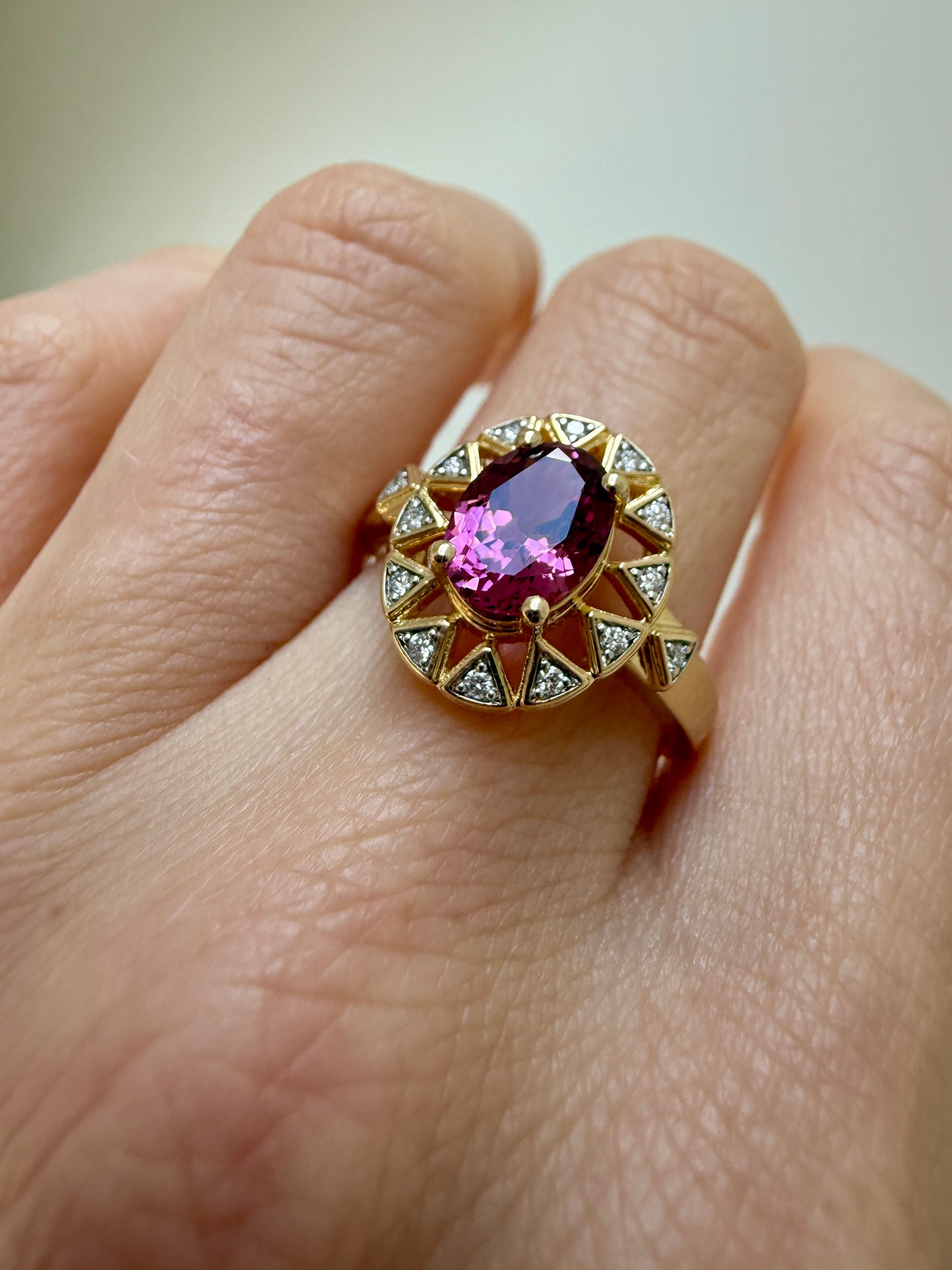 The 10k Sunburst Garnet Ring