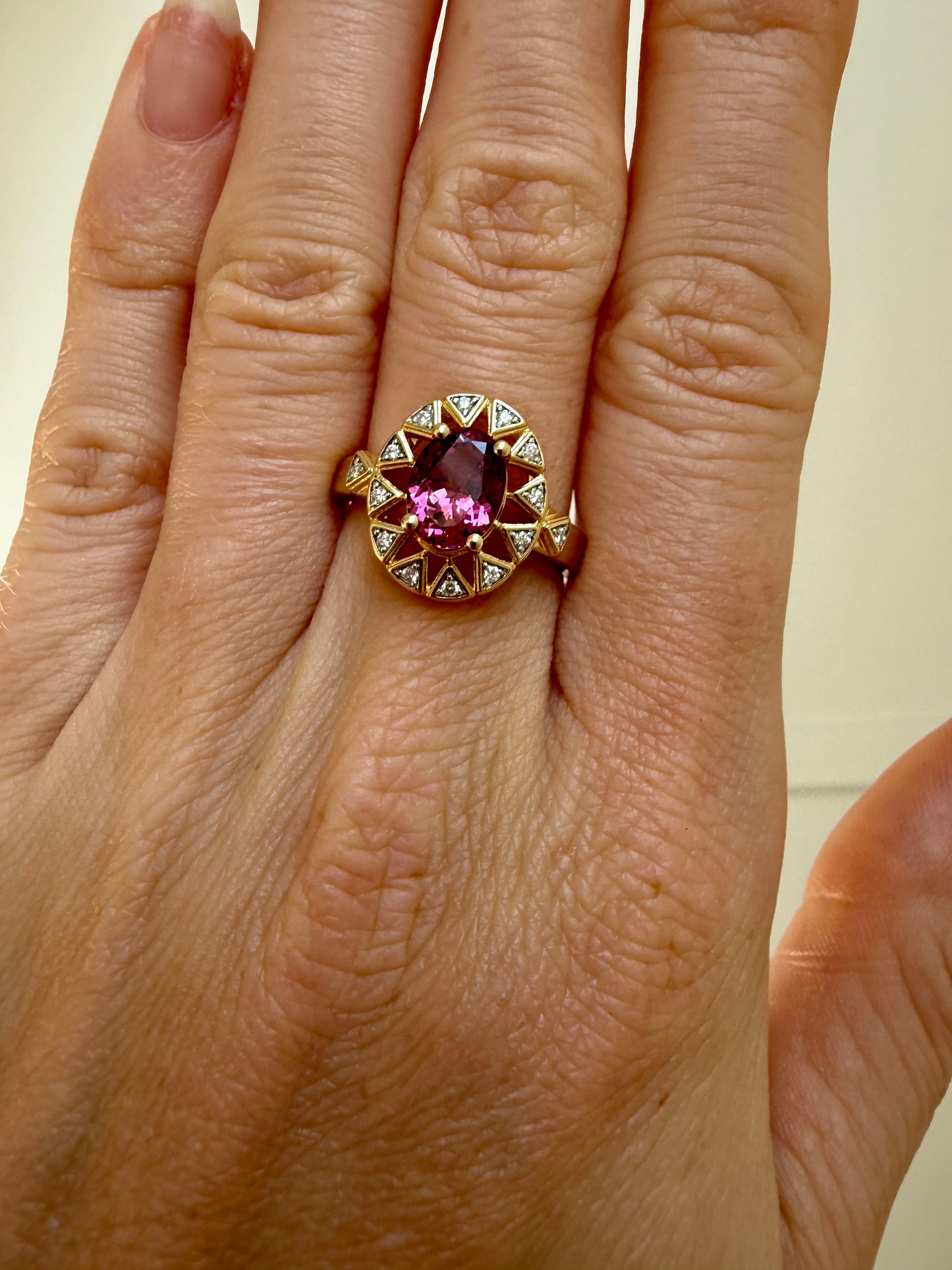 The 10k Sunburst Garnet Ring